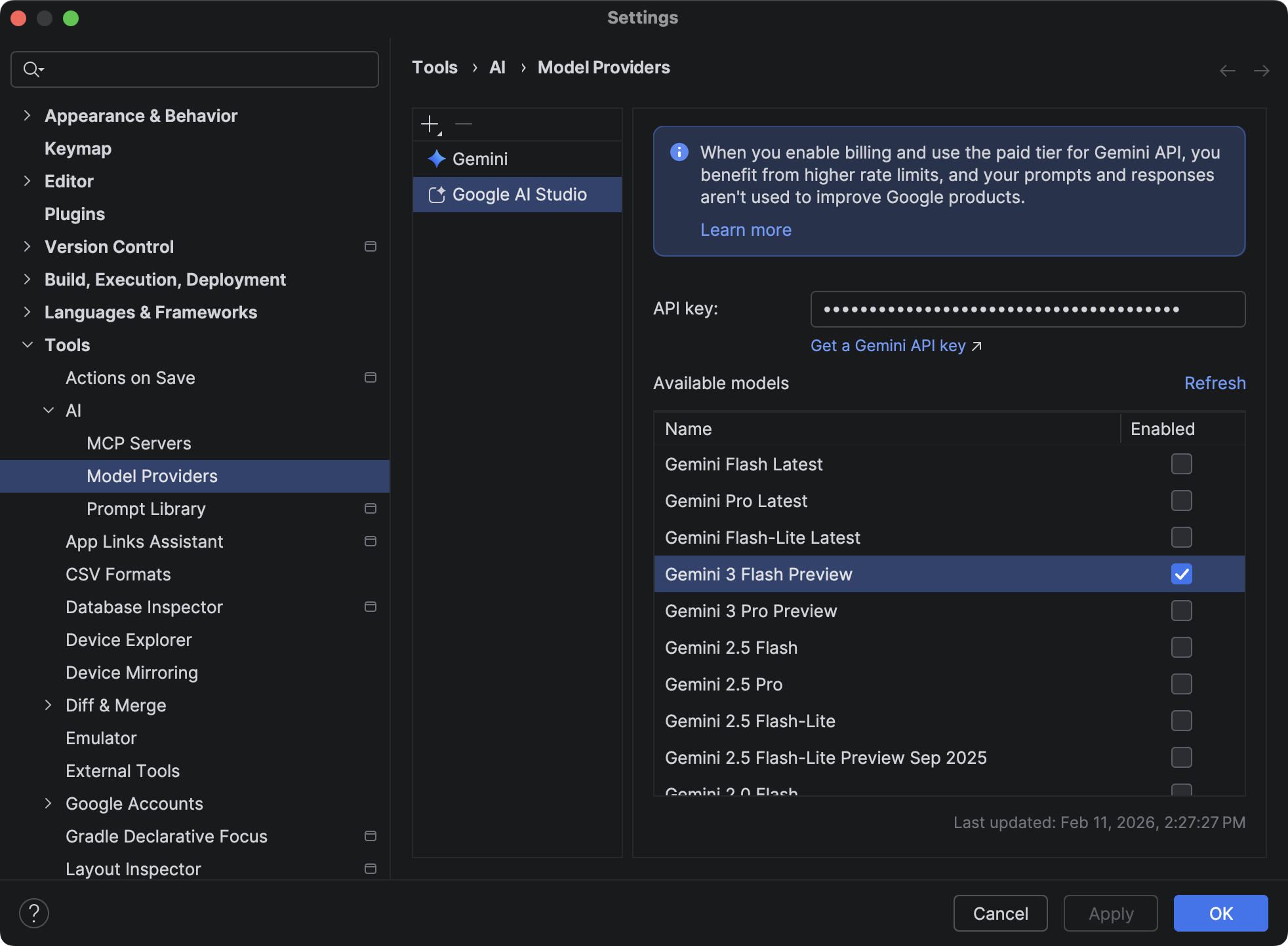 Adding a Google AI Studio API key in Android Studio settings
           under Tools > AI > Model Providers.